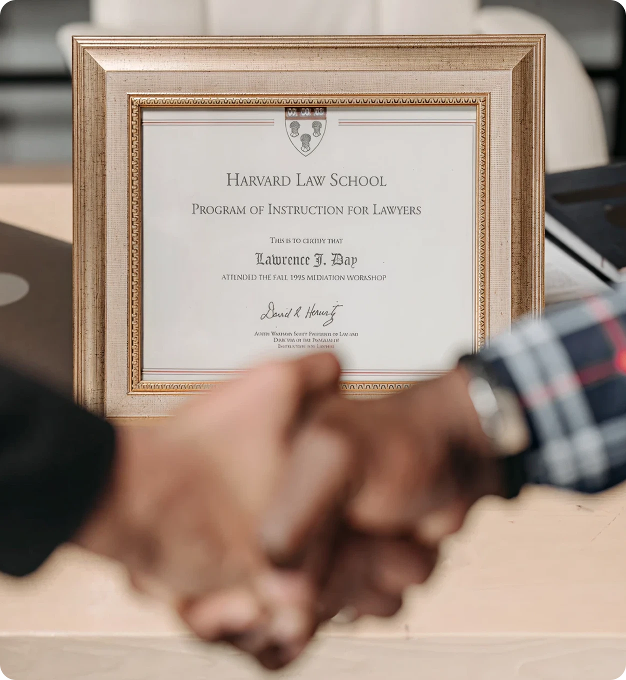 Framed certificate displayed on a desk